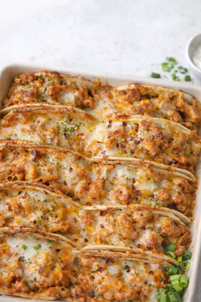 Baked tacos filled with chicken, bacon, and ranch, ready to serve.