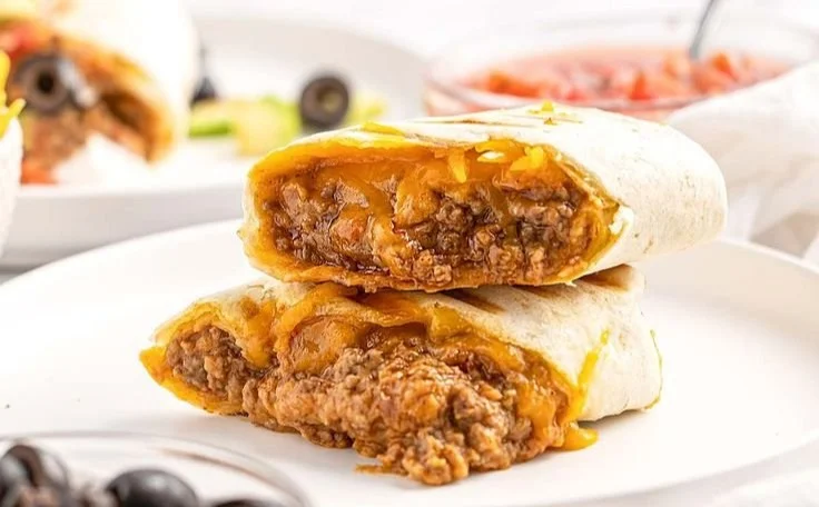 Delicious homemade beef and bean burritos ready to serve