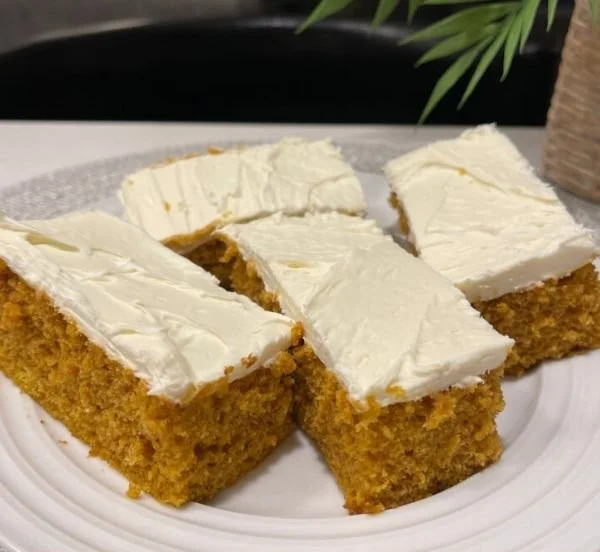 Delicious Pumpkin Cream Cheese Bars topped with cream cheese frosting