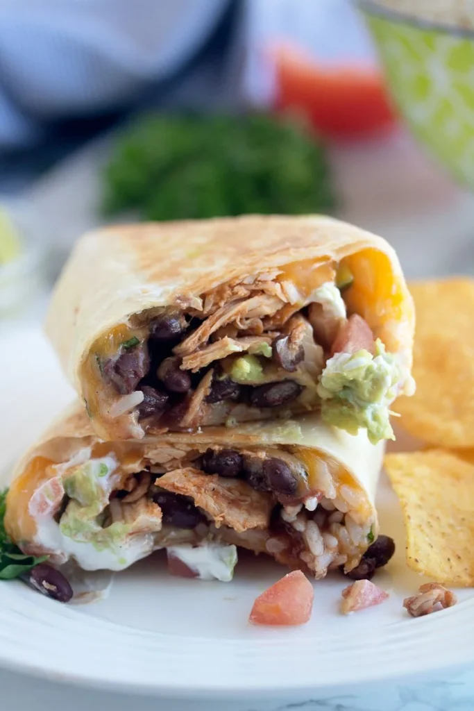 Delicious seven layer chicken burritos with fresh ingredients