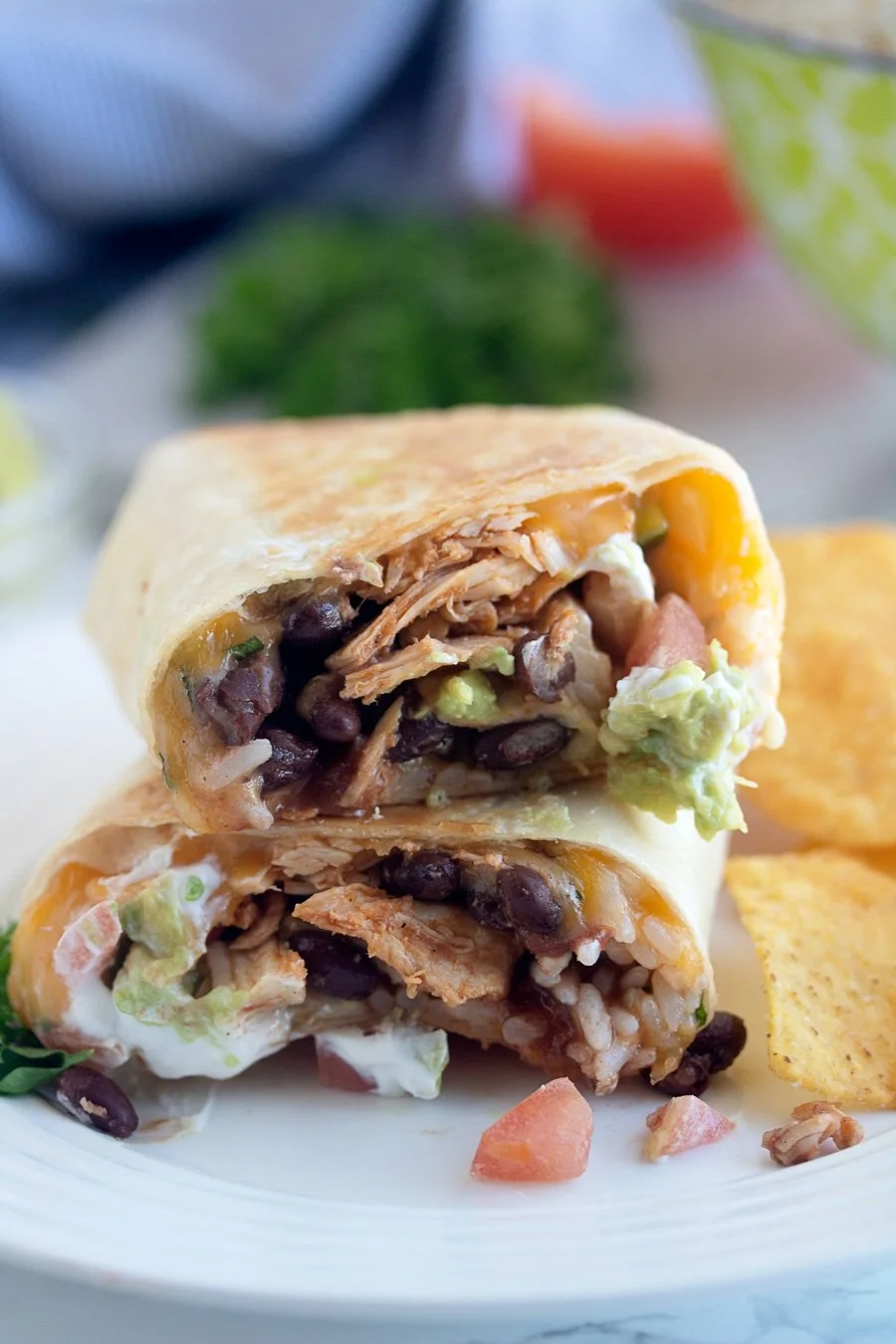 Delicious seven layer chicken burritos with fresh ingredients
