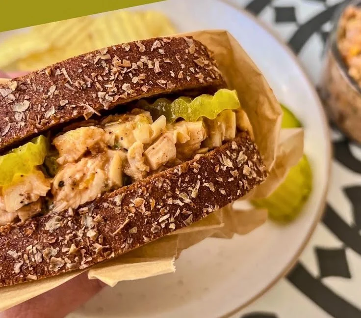 Delicious barbecue chicken salad topped with fresh ingredients and barbecue sauce.