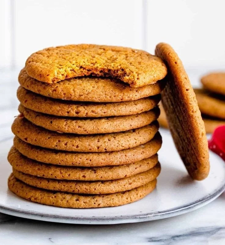 Delicious homemade cardamom cookies with a golden-brown color and aromatic spices.