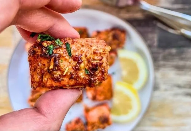Plate of crispy salmon bites made in the air fryer