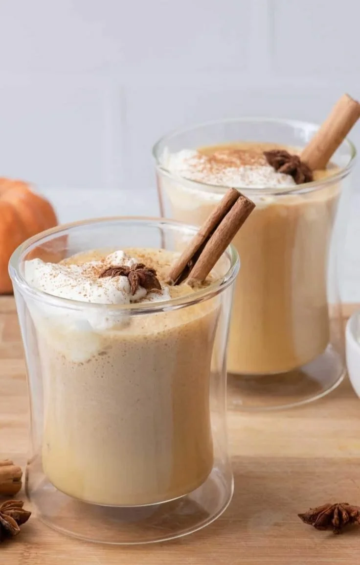 Homemade pumpkin spice latte in a cozy coffee cup