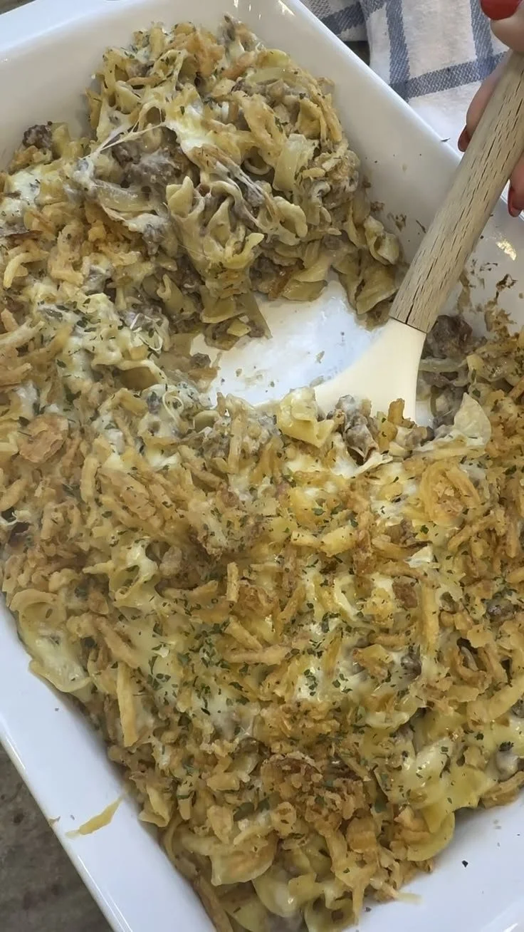 Delicious French Onion Beef Noodle Casserole in a rustic baking dish