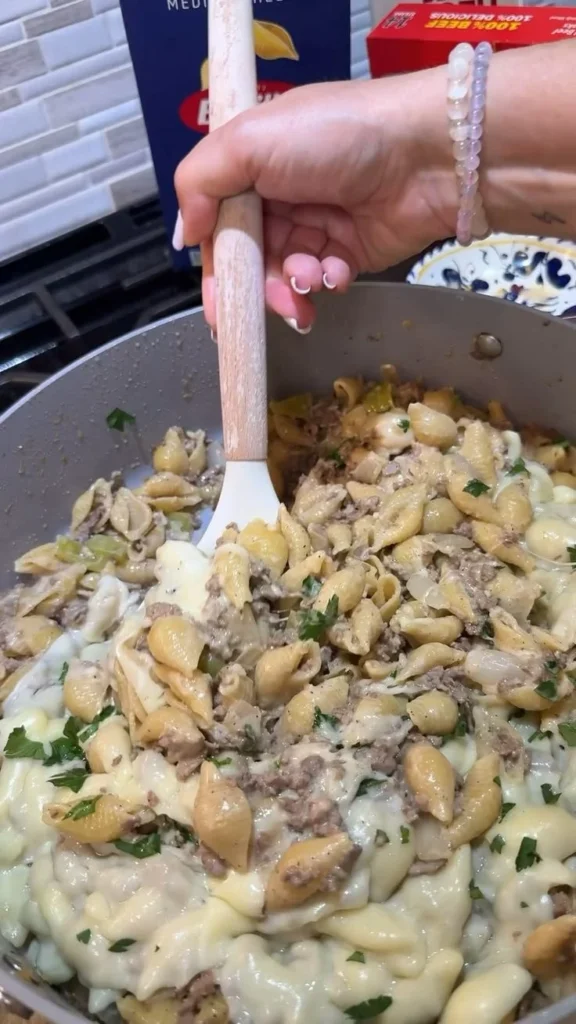 One-pot Philly Cheesesteak Pasta dish with colorful ingredients