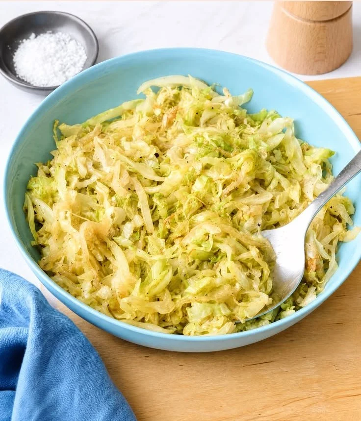 Delicious skillet cabbage sautéed with onions and garlic in a cast-iron skillet.